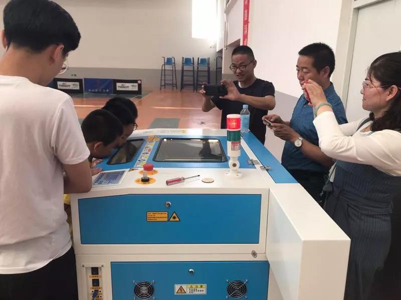 使用高效穩(wěn)定的激光切割機全力以赴助力比賽的選手們